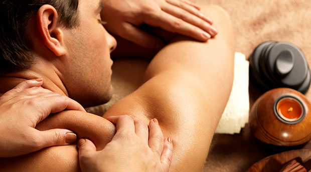 Massage Therapist performing a Pregnancy Massage